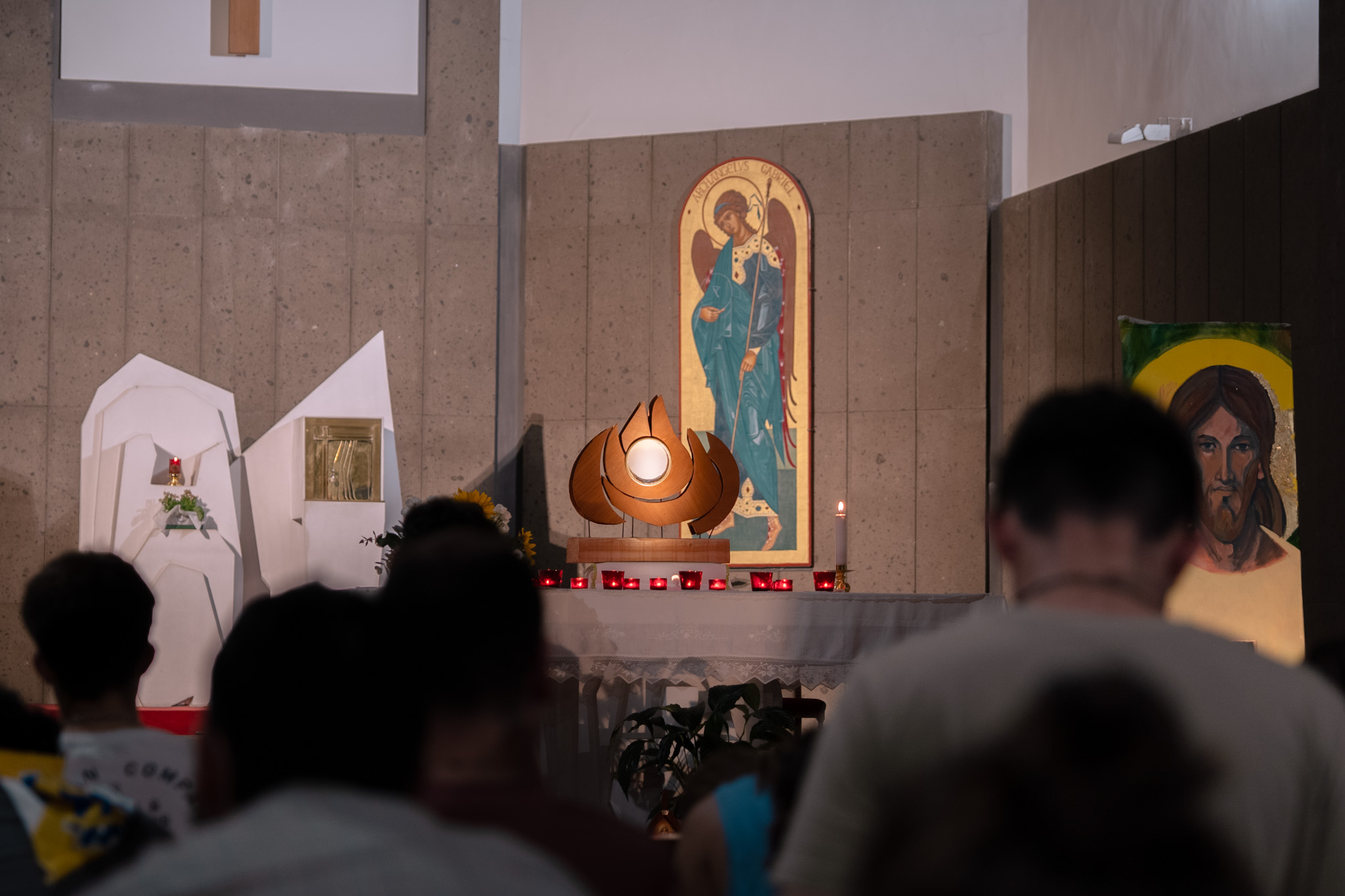 EN: “Do you realize that Jesus is there in the Blessed Sacrament expressly for y